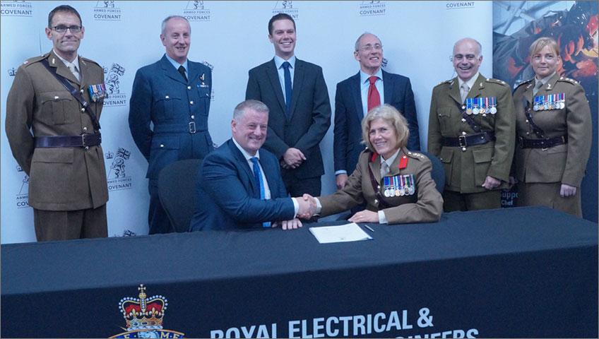Frank Mitchell, CEO SP Energy Networks, signs Armed Forces Covenant
